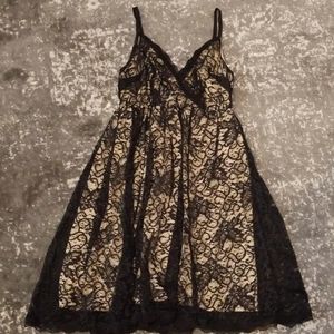 Black lace over nude dress